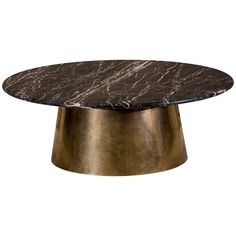 a round table with a black marble top and gold metal base on an isolated white background