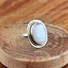 Moonstone Ring, 925 Sterling Silver Ring, Two Tone Ring, Oval Gemstone Ring, White Rainbow Ring, Gift For Her, Boho Wedding Ring, Women Ring :-Main Stone : Moonstone :-Main Stone Color : White :-Main Stone Creation : Natural Gemstone :-Metal : Sterling Silver :-Base Metal : 925 parts per 1000 :-Style : Ring White Oval Cabochon Moonstone Ring For Anniversary, Oval White Crystal Gemstone Ring, White Oval Crystal Gemstone Ring, White Oval Cabochon Promise Ring, White Oval Pearl Ring With Gemstone, Oval Pearl Ring Stamped 925 For Anniversary, White Oval Cabochon Ring For Anniversary, Anniversary Oval Cabochon Moonstone Ring Stamped 925, Adjustable White Oval Rings