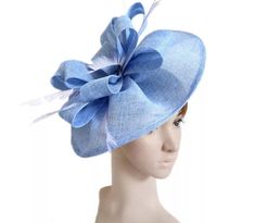 Elegant Blue sinamay Fascinator. Has clips for a secured and comfortable look. This will be a great way to add elegance to any, bridesmaid, rehearsal dinner, Wedding guest, cocktail party, or church outfit. Also, comes in Hot Pink, blush, white, ivory and other colors - Ready to ship - Free Shipping - Fast shipping - Customize by adding different color flowers and or feathers Check my store for for styles and colors. Hatsandpearls.etsy.com Find more at my website: Www.hatsandpearls.com Reach out Royal Blue Fascinator, Navy Blue Fascinator, Ivory Fascinator, Green Fascinator, Red Fascinator, Easter Hat, Fascinator Wedding, Kentucky Derby Fascinator, Blue Fascinator