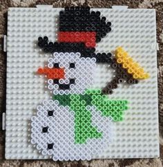 a lego snowman made out of different colored beads