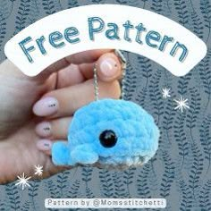 a hand holding a blue stuffed animal with the words free pattern written below it and an image of a person's finger