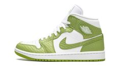 The Women’s Air Jordan 1 Mid SE “Green Python” is a women’s-exclusive version of the mid-top lifestyle shoe that makes use of a reptilian-inspired textile on its design.  This May 2022 release turns heads with olive green-colored leather overlays with python patterning.  The snake-inspired accenting appears on the toe cap, forefoot, eyelets, collar, heel, and Swoosh.  A raised “Wings” logo resides on the collar and green Jumpman and “Air” branding can be found on the white nylon tongue tag.  Rel Green Mid-top Jordan Shoes With Boost Midsole, Jordan 1 Women Green, Nike Air Jordans Lime Green, Green Mid-top Jordan Shoes For Streetwear, Green High-top Jordan Shoes For Streetwear, Jordan 1 Outfit, Air Jordan 1 Outfit, Authentic Jordans, Air Jordan 1 Mid Se