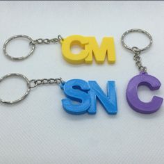 the letters are made out of plastic key chains