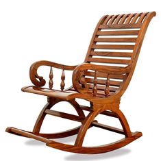 a wooden rocking chair with an armrest and foot rests on a white background,