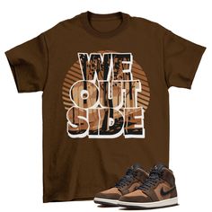 We Outside Jordan 1 Mid Dark Chocolate Softstyle T-Shirt The unisex soft-style t-shirt puts a new spin on casual comfort. Made from very soft materials, this tee is 100% cotton for solid colors. Heather colors and sports grey include polyester. The shoulders have twill tape for improved durability. There are no side seams. The collar is made with ribbed knitting to prevent curling damage. \n.: 100% Cotton (fiber content may vary for different colors)\n.: Light fabric (4.5 oz/yd² (153 g/mn.: Euro Casual Brown Shirt With Graphic Print, Casual Comfortable Fit T-shirt With Letter Print, Brown Shirt With Letter Print For Streetwear, Brown Letter Print Shirt For Streetwear, Brown Short Sleeve Shirt For Streetwear, Trendy Brown Relaxed Fit T-shirt, Brown Crew Neck T-shirt With Text Print, Brown Graphic Tee Shirt With Graphic Print, Brown Text Print Crew Neck T-shirt