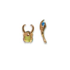 Bring a touch of the Marvel Cinematic Universe to your outfits with these Loki earring studs. They feature a fun depiction of the renowned character in 18k gold-plated brass. A butterfly back keeps these Loki earrings in place. Loki Earrings, Convertible Backpack, Earring Studs, Backpack Tote Bag, A Butterfly, Custom Embroidery, Marvel Cinematic Universe, Marvel Cinematic, Ankle Socks