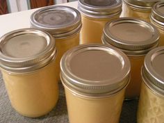 many jars are lined up on the table