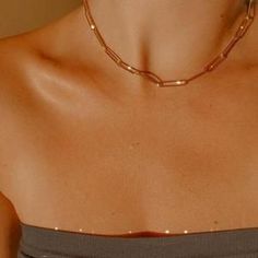 This stunning gold paperclip choker is both dainty and elegant. Made of 925 Sterling Silver, it's the perfect choker to wear as a base before layering it up with other necklaces!  #goldchainnecklace #paperclipchain #paperclipchoker #linkedchoker #chainandlink #linkednecklace #Linkedchoker #paperclipjewelry #linkedjewelry #chainnecklace Chained Necklace, Gold Chain Choker, Safety Pin Earrings, Choker Chain, Gold Coin Necklace, Polymer Jewelry, Gold Chain Necklace, Chain Choker, Etsy Jewelry