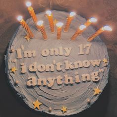 a birthday cake with candles on it that says i'm only 17 i don't know anything