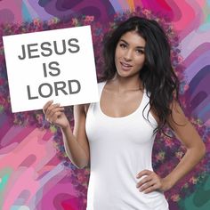 a woman holding up a sign that says jesus is lord in front of a colorful background