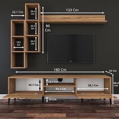 an entertainment center is shown with measurements for the tv and shelves to fit into it