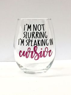 a wine glass with the words i'm not slurring, i'm speaking in cursive