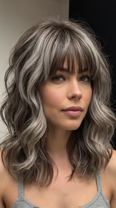 Best Transformations for Layered Bob with Arched Bangs 🔮 Medium Length Gray Hair Over 50 With Bangs, Bangs With Glasses Round Face, Gray Bangs Dark Hair, Grey Hair Bangs Fringes, Glasses Round Face, Shoulder Length Grey Hair With Bangs, Medium Length Layered Hair With Bangs, Arched Bangs, Bangs With Glasses