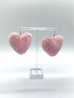 Complete your look with our Pink Fluffy Heart Earrings. These fun and festive accessories will add a touch of quirky cuteness to any outfit. Embrace your playful side and stand out from the crowd with these must-have earrings. Perfect for the fashion-forward and young at heart. Trendy Single Heart Earring For Valentine's Day, Heart-shaped Plug Earrings For Valentine's Day, Trendy Heart Earrings As Gift, Trendy Heart Earrings For Gift, Trendy Heart Shaped Earrings For Gifts, Trendy Heart Earrings For Pierced Ears As Gift, Trendy Heart-shaped Earrings For Gifts, Trendy Heart-shaped Earrings For Valentine's Day, Cute Heart Earrings For Party