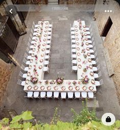 an aerial view of a table set up for a wedding