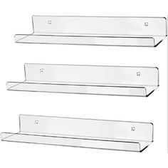 three glass shelves with metal brackets