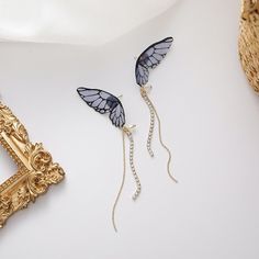 Butterflies represent change and transformation in our lives. Their wings are incredibly delicate, yet they can soar through the sky effortlessly. Wear these stunning Butterfly Wing Tassel Earrings to embrace change and open your heart to new beginnings. Cubic zirconia & alloy Size: 4.3in x 0.6in Push-back closure Hypoallergenic, lead & nickel free If you aren't in LOVE with your purchase, please let us know within 30 days of receiving your item, and you'll receive a stress-free refund. Butterfly Charm Earrings As Gift, Butterfly Charm Wing-shaped Earrings For Gift, Elegant Winged Earrings For Gift, To New Beginnings, Open Your Heart, Long Tassel Earrings, Embrace Change, Butterfly Wing, Hypoallergenic Jewelry