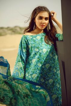 This summer, the new festive collection has been set up with new Pakistani casual printed lawn dresses to give you a cool lavish look in this hot season. You can buy fresh seasonal wear online to adorn your summer look in an elegant way. Shirt: This lawn attire is showing its grace with blue color printed front and back panels for shirt. Lawn shirt is over digitally printed with beautiful flower prints. Sleeves are also beautifully printed in elegant patterns. Trouser: Blue color cambric dyed tr Dresses Stitching Designs, Pakistani Casual Dresses, Stitching Designs, Summer/fall Outfits, Short Frocks, Lawn Dresses, Dress Pakistani, Lawn Dress, Desi Fashion