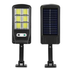 the solar powered street light is shown with two lights on each side and one in front