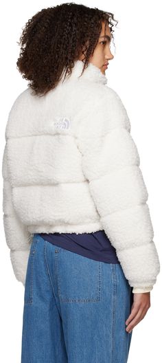 Down-filled quilted sherpa fleece jacket. · Funnel neck · Zip closure · Logo embroidered at chest and back · Zip pockets at waist · Concealed bungee-style drawstring at hem · Elasticized cuffs · Zip pocket at interior · Full satin lining Supplier color: Gardenia white Fill: 75% recycled down, 25% recycled feathers. North Face Clothing, Sherpa Fleece Jacket, North Face Outfits, Sherpa Fleece, Funnel Neck, Jacket Sale, White Shop, Embroidery Logo, Logo Embroidered