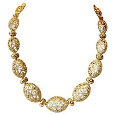 A real statement necklace in 18 K yellow Gold that makes heads turn! Intricate workmanship distinguishes this fabulous necklace. Set with 1595 brilliant cut Diamonds weighing 13.33 ct, G color, vs clarity. Wearable in 2 different lengths: 39.5 cm and 44.4 cm due to a special device to shorten the necklace. Matching earrings available! Masterfully handcrafted piece! Authenticity and money back is guaranteed. For any enquires, please contact the seller through the message center. Luxury Gold Opulent Necklace, Luxury Yellow Fine Jewelry Necklaces, Luxury Art Deco Yellow Gold Necklace, Luxury Yellow Gold Heirloom Necklace, Luxury High Luster Yellow Gold Necklaces, Luxury Yellow Gold Fine Jewelry Drop Necklace, Luxury Engraved Yellow Gold Diamond Necklace, Message Center, Necklace Matching