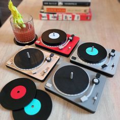 turntables and drinks on a wooden table