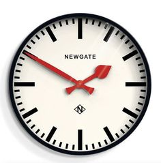 a white clock with red hands and the words newgate on it's face