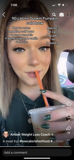 a woman holding a carrot in her mouth and drinking from a cup with the caption, calories dunkin pumpkin cold brew