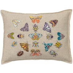 an embroidered pillow with many colorful butterflies on the front and back, all in different colors