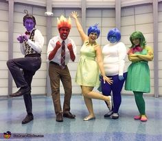 four people dressed in costumes posing for a photo with the caption inside out written above them