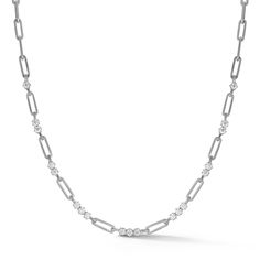 Created as Phoebe's younger sister, the Pia Chain Necklace is a contemporary take on our signature rectangle-link chain with brilliant-cut diamonds. Handcrafted in 18-Karat gold, the Pia Chain Necklace features 19 diamonds for a casual yet sophisticated look. We can't stop pairing this piece with diamond pieces like the Vanguard Riviera and the Penelope Necklace for a stack that can be worn day or night. MATERIALS & MEASUREMENTS Handcrafted in 18-Karat Gold 19 x Diamonds: 1.52 Total Carat We Younger Sister, Brilliant Cut Diamond, Link Chain, Gold Diamond, Diamond Necklace, Chain Necklace, Silver Necklace, Diamonds, Take That