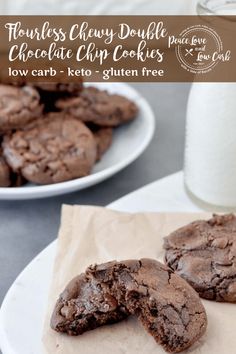 chocolate chip cookies cut in half on a white plate with a glass of milk behind them