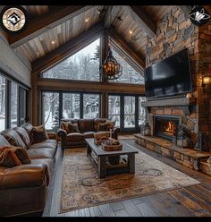 a living room filled with furniture and a flat screen tv mounted to the side of a fireplace