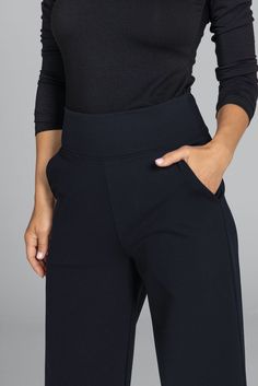 Why we love this: Step into the epitome of grace with our Black Grace Wide Leg Pant. These must-have black dress pants are designed for any occasion. With a super-flattering waist & roomy pockets, you’ll be dashing from desk-to-dinner with ease. Features: KiraGrace PowerStrong: Feels like cotton, keeps you dry High-rise, 32" inseam, Leg Opening: 25" Slimming high waist w/side pockets Made in U.S.A. of imported fabric Waist: High-Waisted (13" Rise) Inseam: 32" inseam, easy to hem For easy alterations - click here Leg Shape: Straight wide leg Sizing: Relaxed fit, size down if in between sizes Compression: Flowy- No compression Model, Kori, is 5'10" and wearing a size small Travel Pants, Wide Leg Pant, Black Dress Pants, The Grace, Yoga Tops, Chic Fashion, Top Sales, Tight Leggings, Tops For Leggings