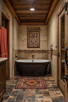 a bath tub sitting in the middle of a bathroom