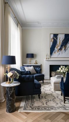 a living room filled with furniture and a fire place in the middle of a room