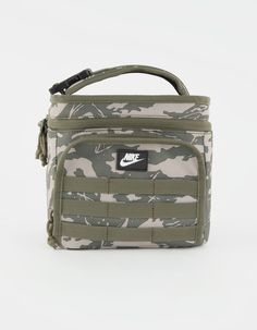 Nike Sportswear Futura Lunch Bag. Main Insulated Compartment. Front Zip Pocket. Label On Front. Adjustable Shoulder Strap. Top Carry Handle. Volume: 6l. Approx. Dimensions: 8'' L X 8.5'' W X 7.5'' D. 100% Polyester. Imported. Casual Nylon Gym Bag For Workout, Nike Green Bags For Outdoor Activities, Nike Casual Bags For Outdoor Activities, Sporty Bag With Water Bottle Pocket For Sports, Casual Nike Bags For Outdoor Activities, Sporty Green Bags For Streetwear, Casual Nylon Bags For Workout, Nike Functional Outdoor Bag, Nike Nylon Gym Bag