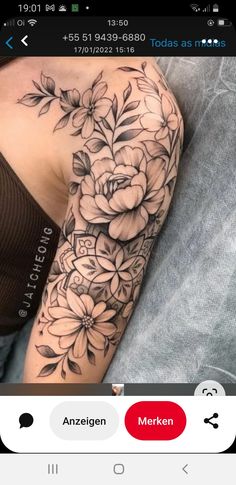 a woman's arm with flowers on it