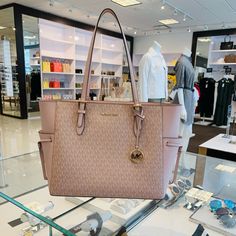 100% Authentic New With Tags Price Is Firm Color: Ballet Michael Kors Gilly Large Drawstring Travel Tote - Measurements: 11.5”H X 6.5”W X 14”L - Gold Tone Hardware - Top Zip Closure - Michael Kors Signature Pvc And Saffiano Leather - Interior: 2 Slip Pockets And 1 Zipper Pocket - Exterior: 2 Side Slip Pockets Mk Pink Bag, Feminine Michael Kors Travel Bags, Michael Kors Feminine Bags With Gold-tone Hardware, Feminine Michael Kors Bags With Gold-tone Hardware, Elegant Michael Kors Bags For Errands, Pink Michael Kors Purse, Mk Tote Bag, Black Tote Purse, Michael Kors Tote Bag