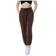 Stay stylish and comfortable in our women's baggy sweatpants featuring a unique design with two side pockets and an adjustable drawstring wide elastic waist for a custom fit. These wide-leg pants with elastic cinch bottom offer a loose fit and athletic look. The active high-waisted sweatpants are perfect for workouts, lounging, and casual wear in spring, fall, and winter. With extra-long length and fleece fabric, these joggers provide warmth and style. The convenient two side pockets allow you t Trendy Baggy Sweatpants With Drawstring, Baggy Drawstring Sporty Sweatpants, Sporty Loose Fit Sweatpants With Drawstring, Sporty Baggy Joggers With Drawstring, Sporty Baggy Drawstring Sweatpants, Sporty Baggy Sweatpants With Drawstring, Baggy Cargo Pocket Joggers For Loungewear, Trendy Baggy Joggers With Drawstring, Baggy Drawstring Harem Pants For Loungewear