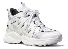 Lavender Mist, Michael Kors Sneakers, Michael Kors Collection, Nike Huarache, Michael Kors Shoes, Side Panels, Metallic Accents, Panel Siding, Smooth Leather