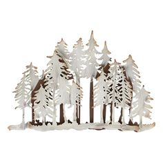 a wooden cutout of trees with snow on the ground