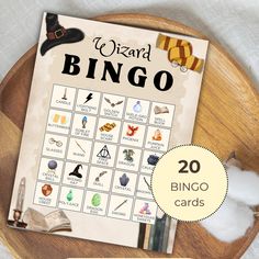 the wizard's board game is shown on a wooden plate with cotton and other items