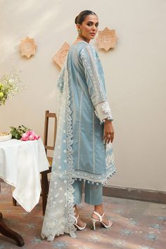 Try Sky Blue Embellished Pakistani Kameez Salwar Suit with Dupatta in Classical Jacquard lawn Kameez Salwar that is an elegant masterpiece that will give you a stunning look with a contrast of white and sky blue color. Hand-crafted embellishments and threads make this kameez and trousers style Dress an epitome of beauty and your foremost priority for the functions. Jacquard Kameez: The beautiful kameez is gracefully Hand embellished, with floral designs. Hand-crafted details of motifs and sequin Pakistani Kameez, Suit With Dupatta, Simple Kurti, Pakistani Designer Clothes, Dresses Design, Simple Kurti Designs, Lawn Suit, Organza Sleeves, Pakistan Fashion