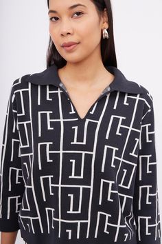 Introduce a touch of modern elegance to your wardrobe with the Maze Polo-Neck Crop Knit Blouse. Featuring a sophisticated maze pattern in contrasting anthracite and ecru, this blouse is crafted from 100% organic cotton, offering exceptional softness and breathability for all-day comfort.  Designed with a contemporary polo-neck and a chic cropped length, the Maze Polo-Neck Crop Knit Blouse pairs perfectly with high-waisted jeans, skirts, or tailored pants. The intricate maze pattern adds a touch Elegant White Jacquard Knit Top, Jacquard Knit Long Sleeve Tops For Work, Long Sleeve Jacquard Knit Tops For Work, Chic Jacquard Knit Top For Workwear, Maze Pattern, Shirt Blouses Women's, Knit Blouse, August Birthstone Jewelry, July Birthstone Jewelry