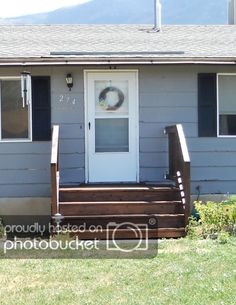 a house with steps leading up to the front door