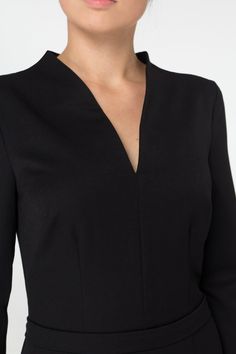 "A beautiful black dress featuring pencil silhouette, midi length and high neck collar. - Stand up collar with v-neck - Fitted pencil silhouette - Knee length (midi) - 3/4 sleeves - concealed back zipper closure Color: Black. Fiber: viscose 45%, elastane - 5%, polyester - 50% For Size S: dress length - 40\", sleeve length - 14,5\" (2/3) Our model wears size S (US 6) and is 171cm/5'6\" tall. You may feel free choosing the size. Just send us your measurements (bust, waist, hips, height). We will d Elegant V-neck Bodycon Dress For Formal Occasions, Classic V-neck Mini Dress For Semi-formal Occasions, Chic V-neck Midi Dress For Business, Elegant Fitted V-neck Dress For Semi-formal Occasions, Elegant Fitted V-neck Dress With Flattering Silhouette, Elegant Fitted V-neck Semi-formal Dress, Dressy V-neck Midi Dress For Office, Chic Sheath V-neck Dress For Formal Occasions, Fitted V-neck Bodycon Dress For Office