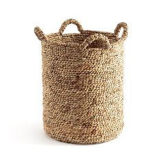 a large woven basket with two handles on the top and one handle at the bottom