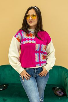 Embrace retro vibes with our Groovy Granny Square Sweater, a bohemian-inspired masterpiece that channels the spirit of the '70s. This sweater features a delightful array of granny squares, creating a playful and eclectic design. With its cozy feel and vibrant colors, it's the perfect addition to your wardrobe for a stylish and nostalgic touch.Model & Fit Model: Sheridan (5' 1" and Size 4 or S) is wearing a size small Relaxed Fit High Stretch Unlined Crew Neck Fabric & Care Material: 65% Cotton 3 Square Sweater, Aztec Print Sweater, Granny Square Sweater, Eclectic Design, Granny Squares, Aztec Print, Retro Vibe, Outerwear Women, The Spirit