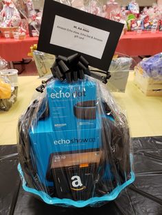 an electronic device wrapped in plastic sitting on top of a table